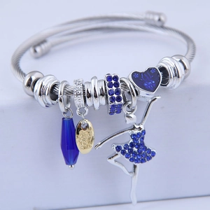 Silver beaded bracelet with ballet dancer charm, blue crystal drop and heart pendant