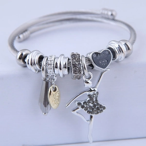 Silver cable chain bracelet featuring ballet girl pendant and sparkling crystal charms