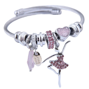 Silver charm bracelet with pink crystal ballerina and engraved heart charms