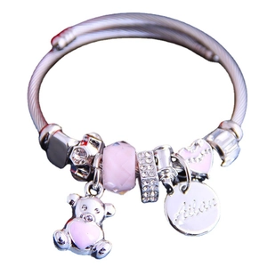 Pink heart charm bracelet with silver bear pendant and beaded stainless steel wristband