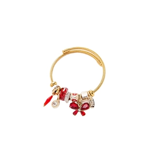 Adjustable golden wire bangle featuring red crystal charms and detailed butterfly pendant