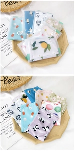 Close-up of assorted printed cotton panties with individual frosted zipper bags