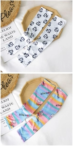 Detail of high-elastic ice silk sun protection sleeves with cartoon and rainbow prints