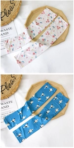 Detail of floral and graphic ice silk cooling arm sleeves with high elasticity fabric