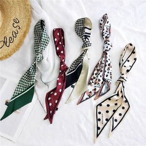 Selection of five patterned narrow silk scarves with polka dots and houndstooth prints