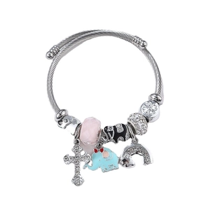 Silver beaded bracelet with elephant, cross, and rainbow pendants on twisted wire