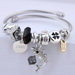 Silver beaded wire bracelet with crystal dolphin pendant and handmade charm charms