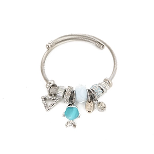 Silver beaded bracelet with blue fish pendant and hollow heart charms on steel wire band