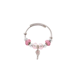Silver charm bracelet with pink glitter beads and hot air balloon pendant on white background