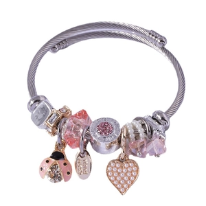 Handmade stainless steel bangle with pink crystal, pearls and heart charms in Pandora style