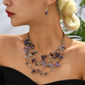 Bohemian multilayer necklace and earrings set with purple crystal stones and silver beads
