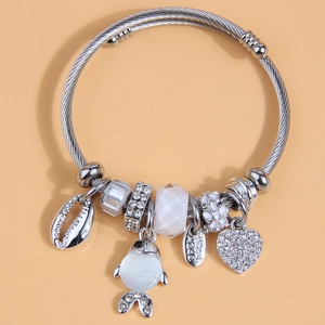 Silver stainless steel wire bracelet with charms like sea shell and crystal heart