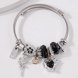 Stainless steel cuff bracelet with fairy charms, crystal heart and handmade pendants