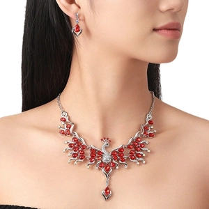 Peacock crystal jewelry set with red gemstones and rhinestone necklace and earrings