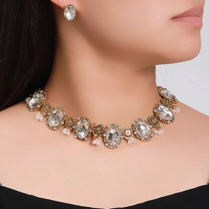 Vintage gold jewelry set with oval crystal gemstones and pearls for women
