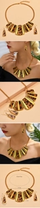 Detail view of retro leopard print necklace and earrings set in matte gold alloy