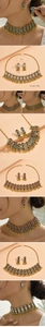 Detail view of vintage ethnic jewelry set featuring crystal choker and fringe earrings
