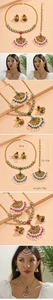 Detail view of ethnic jewelry set featuring gold metal with pearls and colorful gemstones