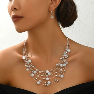 Bohemian multi-layer necklace set with white cat eye stone beads and matching earrings