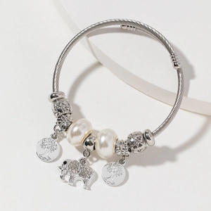 Bracelet ajustable en acier argenté avec pendentifs éléphant et arbre de vie sertis