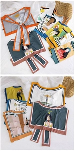 Artistic silk scarves with cartoon patterns and floral prints on cotton background
