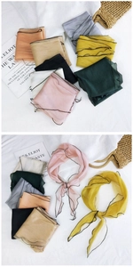 Close-up of assorted mesh chiffon scarves with elegant wavy lettuce edges in vibrant colors