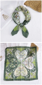 Detailed view of green floral cotton linen square scarf showing bowtie and flat pattern