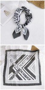 Detail of cotton linen scarf featuring black and white stripes and The Best For You text