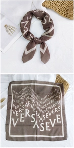 Detail of brown cotton-linen square scarf with white luxury brand logo pattern print
