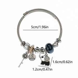 Silver stainless steel charm bracelet with elephant, heart beads, and blue glass beads