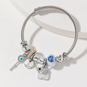 Silver bead bracelet with elephant charm, blue heart glass and 5 PARIS pendant