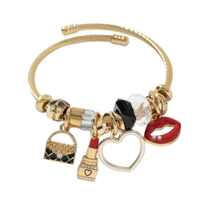 Adjustable gold charm bracelet featuring handbag, lipstick, heart and lip pendants