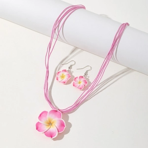 Parure de bijoux fleur de Frangipanier rose avec collier et boucles d'oreilles de plage