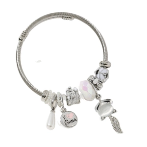 Silver beaded bracelet featuring I Love China charm and cute animal pendant on white background