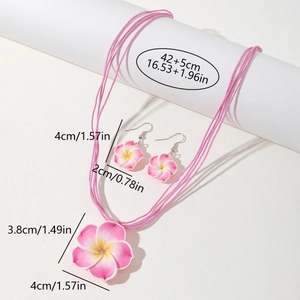 Détail du parure bijoux fleur de frangipanier rose avec dimensions collier et boucles