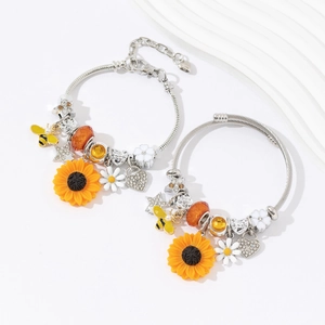 Set di bracciali con ciondoli a girasole e ape in acciaio inox e perline