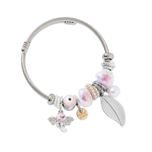 Silver twisted wire bracelet with elephant pendant and pink beads on white background