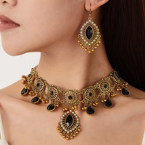 Parure de bijoux ethniques vintage en bronze avec pierres noires et franges en métal