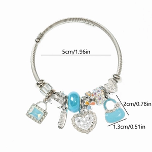 Detail of silver steel wire bracelet with heart charms and blue beads showing dimensions