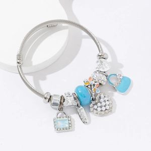 Silver stainless steel charm bracelet with blue glass beads and pearl heart pendant