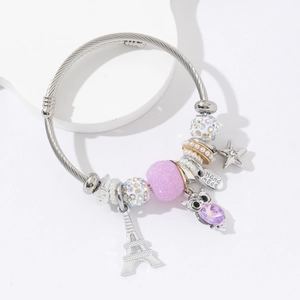 Bracelet à breloques en acier argenté avec pendentif chouette et perles tour Eiffel