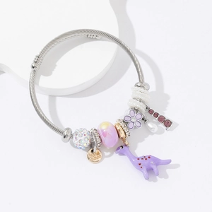 DIY stainless steel charm bracelet with purple dinosaur, flower beads and faux pearls