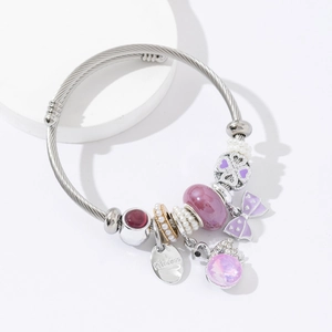Silver stainless steel bracelet with purple glass beads, pearls and princess pendant