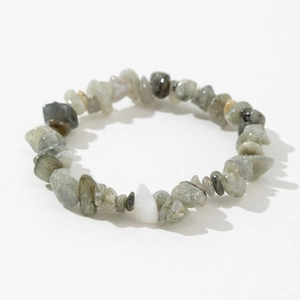 Detailed close-up of natural labradorite gemstone chips on an elastic beaded bracelet