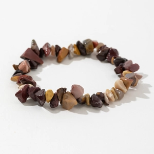 Detailed view of polished natural amethyst and multi-color stone beaded stretch bracelet