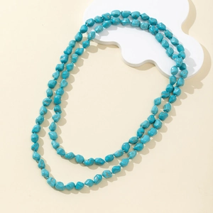 Handmade turquoise beaded necklace with irregular stones in a double layer styling