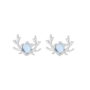 Detail of silver reindeer antler earrings with round blue moonstone inlay