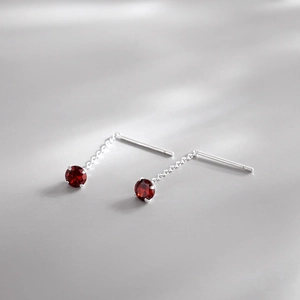 Elegant S925 sterling silver tassel earrings featuring high-quality red zircon stones