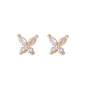 Detailed close-up of golden butterfly stud earrings with sparkling clear zircon stones