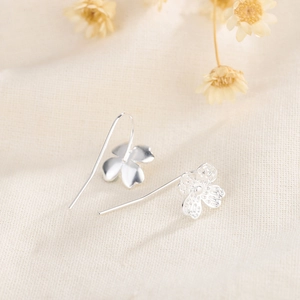 Elegant 925 sterling silver cherry blossom drop earrings with textured floral petal design